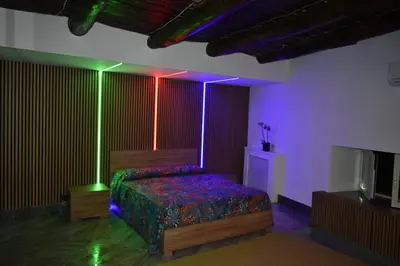 Letto o letti in una camera di LA DIMORA DI TOTÒ