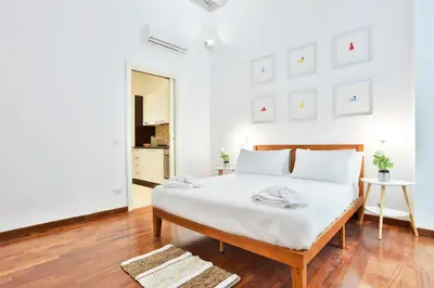 Letto o letti in una camera di GuestHost - Casa Pajolo