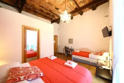 Letto o letti in una camera di Talismano Luxury Rooms & Apartments