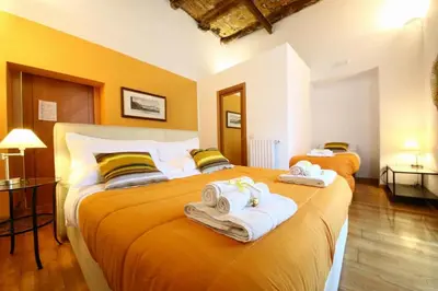 Letto o letti in una camera di Talismano Luxury Rooms & Apartments