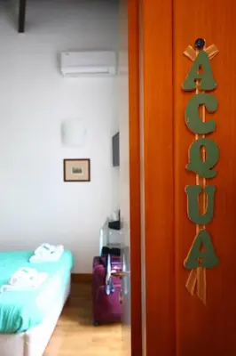 Letto o letti in una camera di Talismano Luxury Rooms & Apartments