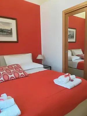 Letto o letti in una camera di Talismano Luxury Rooms & Apartments