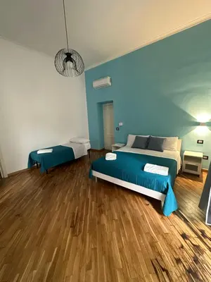 Letto o letti in una camera di Carmè Guest House