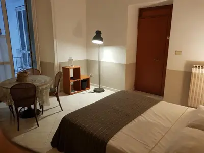 Letto o letti in una camera di Dreaming of Naples