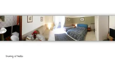 Letto o letti in una camera di Dreaming of Naples