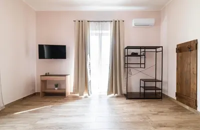 TV o dispositivi per l'intrattenimento presso Relais Borbonico Apartment
