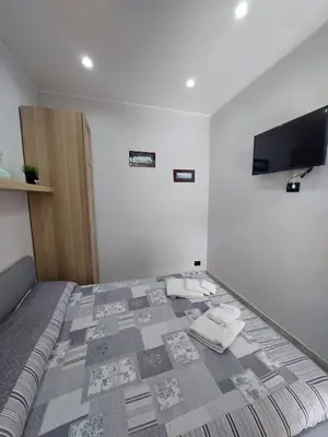 Letto o letti in una camera di City Wonders B&B