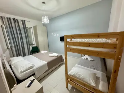Letto o letti in una camera di Casa Maria