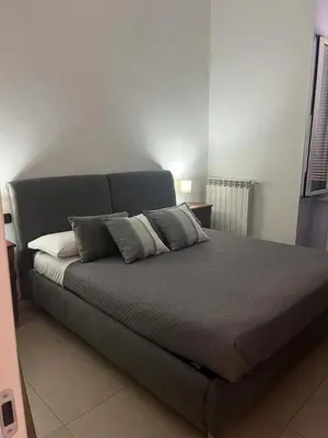 Letto o letti in una camera di Duomo family house