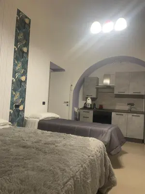 Letto o letti in una camera di Duomo family house