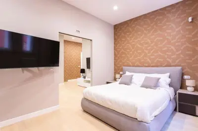 Letto o letti in una camera di Casa Ilaria