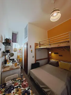 Letto o letti in una camera di Garden City