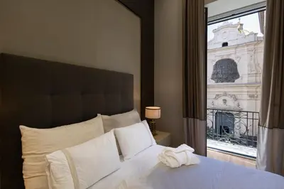 Letto o letti in una camera di luxury and exclusive Bovio square house