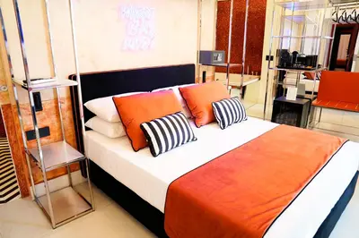 Letto o letti in una camera di Kind Places - Suite Experience