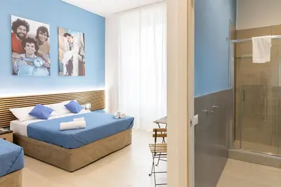 Letto o letti in una camera di The HeArt Guest House