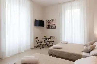 Letto o letti in una camera di The HeArt Guest House