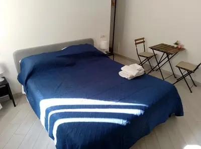 Letto o letti in una camera di Rooms add e criatur