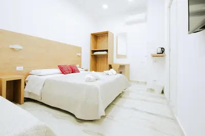 Letto o letti in una camera di Light