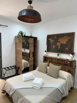 Letto o letti in una camera di Gennarino Apartments - Panorama Suite with balcony and Urban Loft