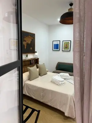 Letto o letti in una camera di Gennarino Apartments - Panorama Suite with balcony and Urban Loft
