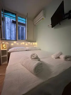 Letto o letti in una camera di Ollyday