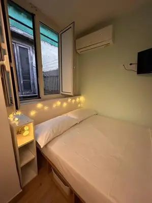 Letto o letti in una camera di Ollyday