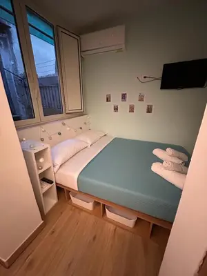 Letto o letti in una camera di Ollyday