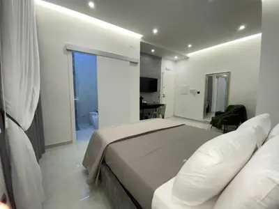 TV o dispositivi per l'intrattenimento presso Calasanzio26 Luxury Rooms