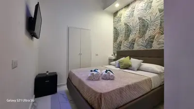 Letto o letti in una camera di San Petrillo APARTMENT