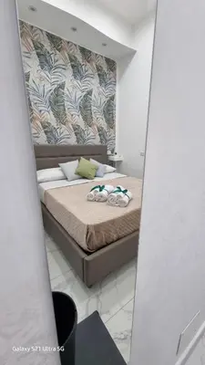 Letto o letti in una camera di San Petrillo APARTMENT