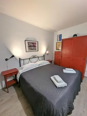 Letto o letti in una camera di La Sartoria - Casetta napoletana