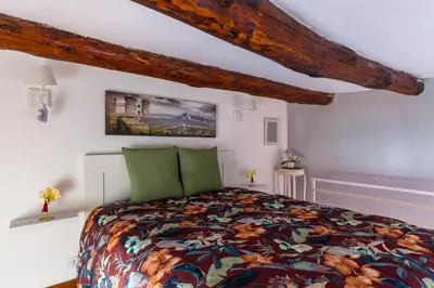 Letto o letti in una camera di Toledo House Apartments