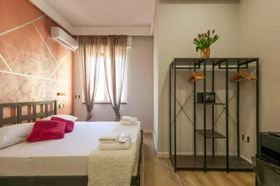 Letto o letti in una camera di Cuore Napoli Centro