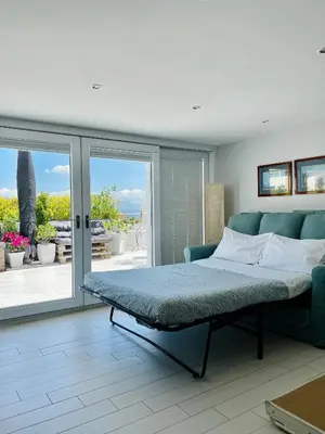 Letto o letti in una camera di Terrazza Iaia