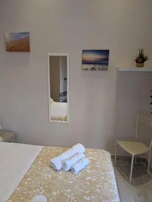 Letto o letti in una camera di La Dimora di Dora
