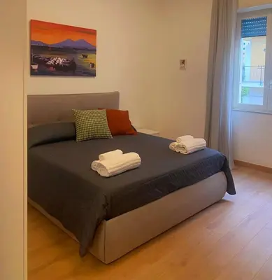 Letto o letti in una camera di Vesuvia