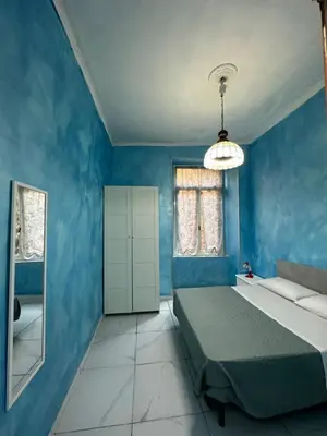 Letto o letti in una camera di Holiday House Clara&Vincenzo