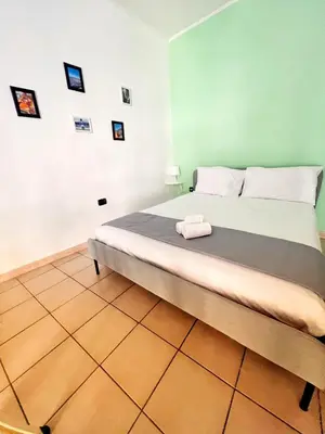 Letto o letti in una camera di La casa di Re Ferdinando