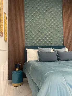 Letto o letti in una camera di DOMUS LUIGI LEONE 2