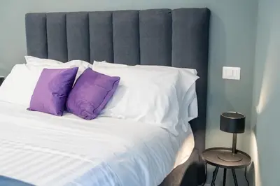 Letto o letti in una camera di Bovio Boutique Studio Apartment