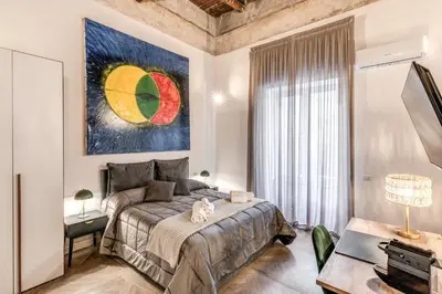 Letto o letti in una camera di Boutique Quartieri Spagnoli