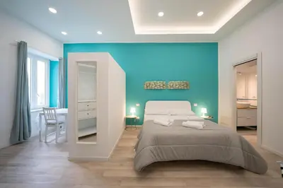 Letto o letti in una camera di Residenza Pugliese - Golfo di Napoli By Dimorra