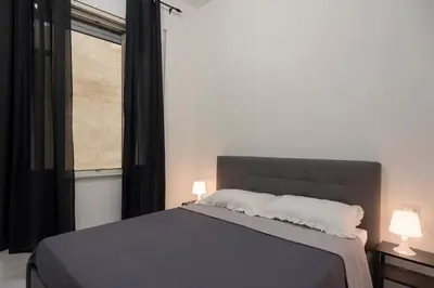 Letto o letti in una camera di Sweet home Q.S