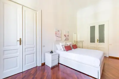 Letto o letti in una camera di Santa Lucia Apartment by Wonderful Italy