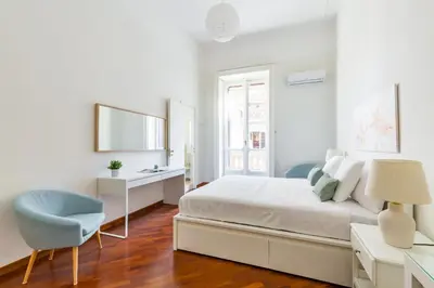 Letto o letti in una camera di Santa Lucia Apartment by Wonderful Italy
