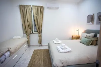 Letto o letti in una camera di Casa Pelusa: Apartment near Maradona Murales