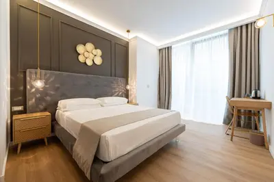 Letto o letti in una camera di Toledo Relais Suites