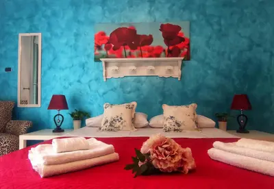 Letto o letti in una camera di San Gennaro House 202