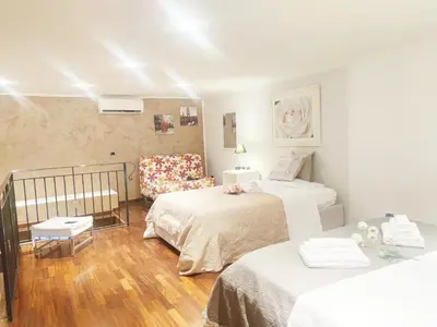 Letto o letti in una camera di Santa MariaHouse 202