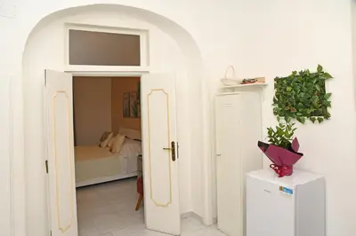Letto o letti in una camera di Incoming Quartieri Spagnoli